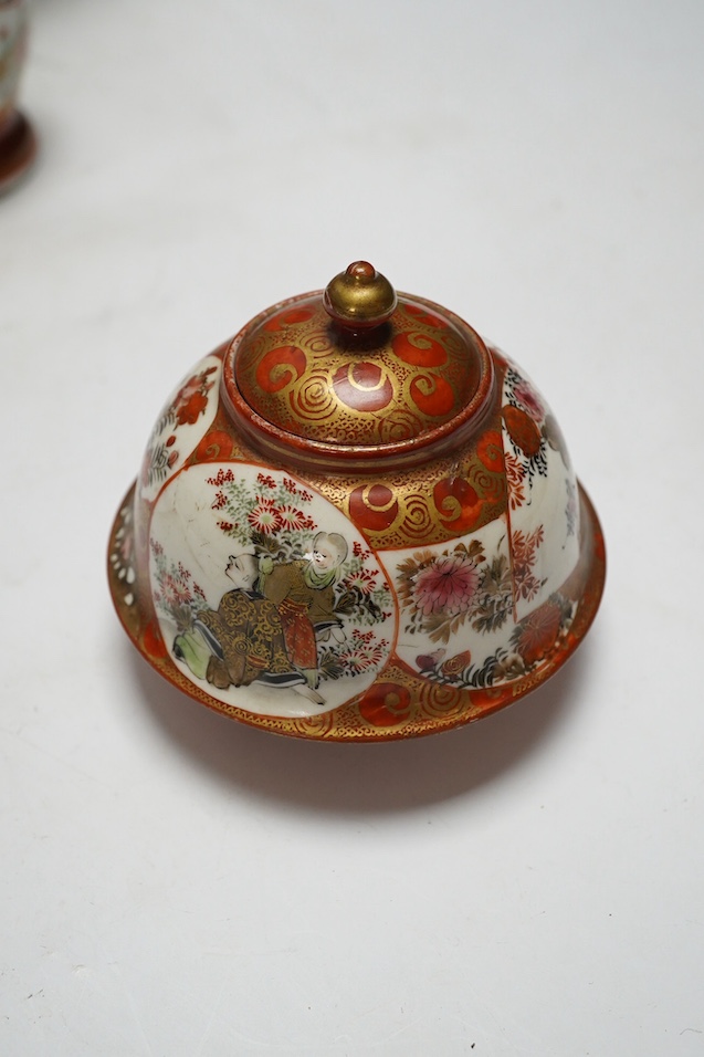 Japanese Kutani, Satsuma and Imari; four vases, a bowl, a pair of candlesticks and a pot (8). Condition - candle sticks damaged